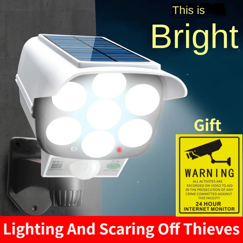Home Security Camera - 屋外ソーラーライトモーションセンサーセキュリティダミーカメラワイヤレスフラッドライトIP65防水77 LEDランプ3モード家庭菜園用